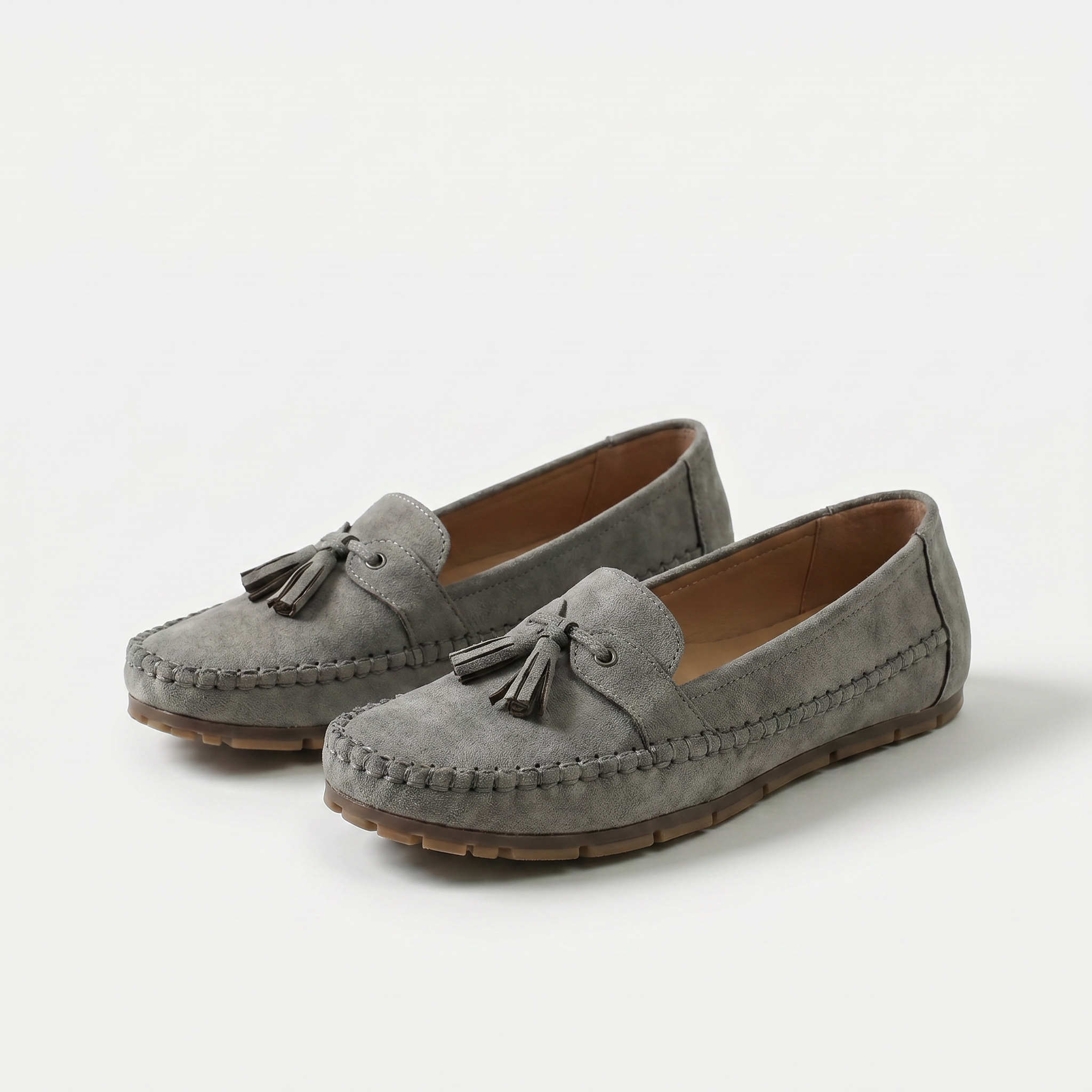 Nádia - Mocassins clássicos com detalhes em borlas